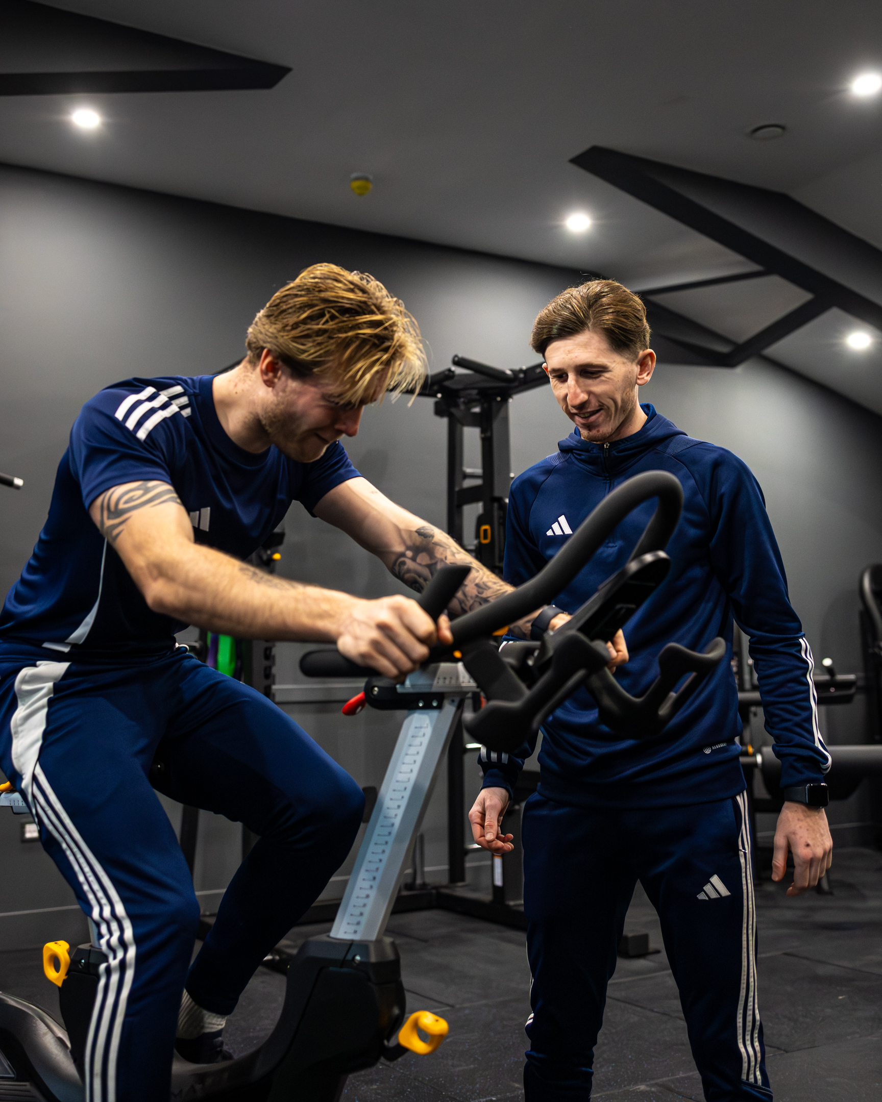 View of GB10 Eltham Hall with double doors opening onto outdoor terrace seating.