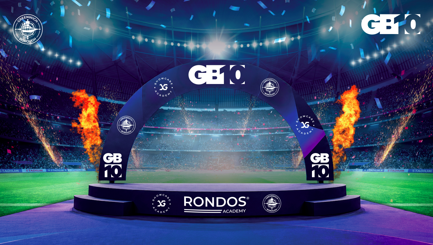 GB10 Sports-branded presentation stage in a large football stadium, with confetti and flames creating a celebratory atmosphere.